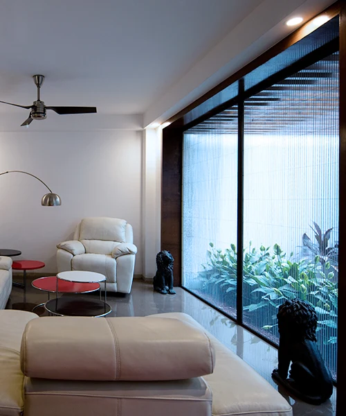 Mosquito screen fitted to a bright balcony doorway
