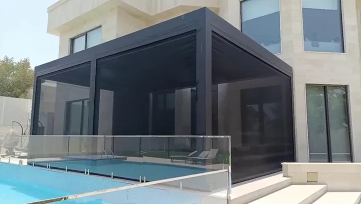 Motorized screens around a poolside pergola